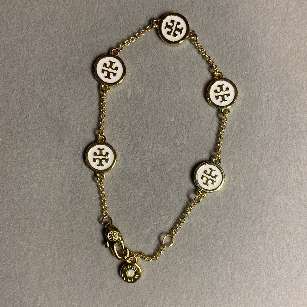 Tory Burch Gold Chain Bracelet with White Emblems ( Buyer’s Choice )
